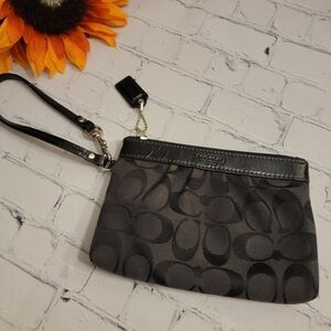 Coach Signature C Patterned  Canvas And Blacke Leather Wristlet